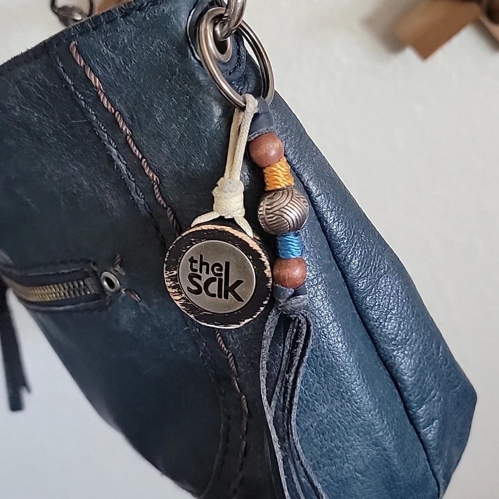 The Sak Navy Blue Leather Hobo with Brown Braided Strap